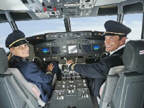 Пилот и стюардесса в кабине самолёта-pilot and hostess in a plane's cabin 