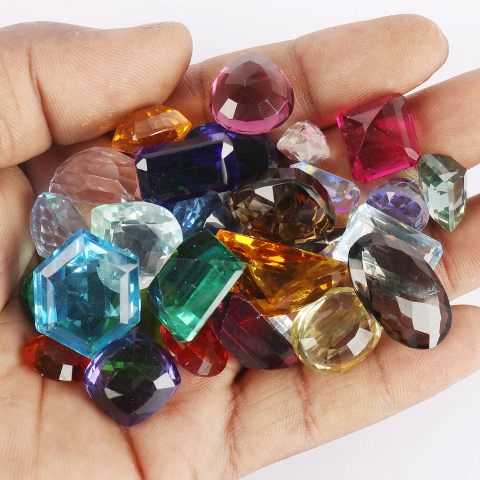 Precious Stones In The Palm Of A Hand