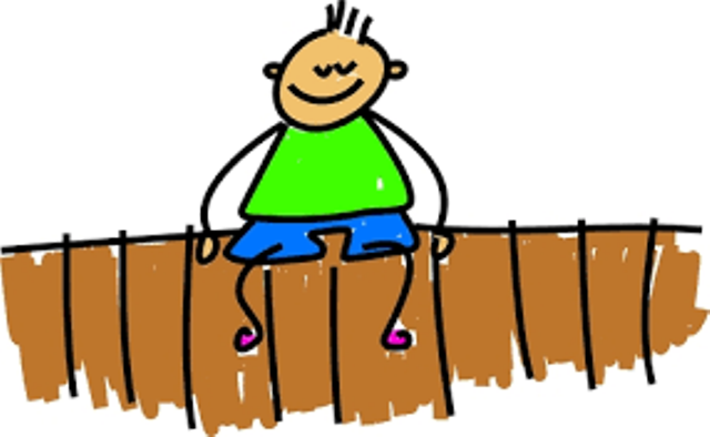 A Boy Sitting On The Fence