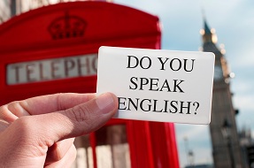 Do You Speak English A Slip Of Paper In Front Of A Red Phone Booth