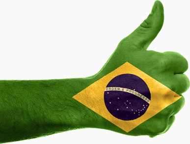 Hand With Thumbs Up Painted In Brazilian Flag Colours