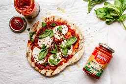 Italian Pizza With A Mutti Sauce Jar