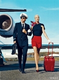 Pilot With Stewardess Walking In Front Of An Airplane 2